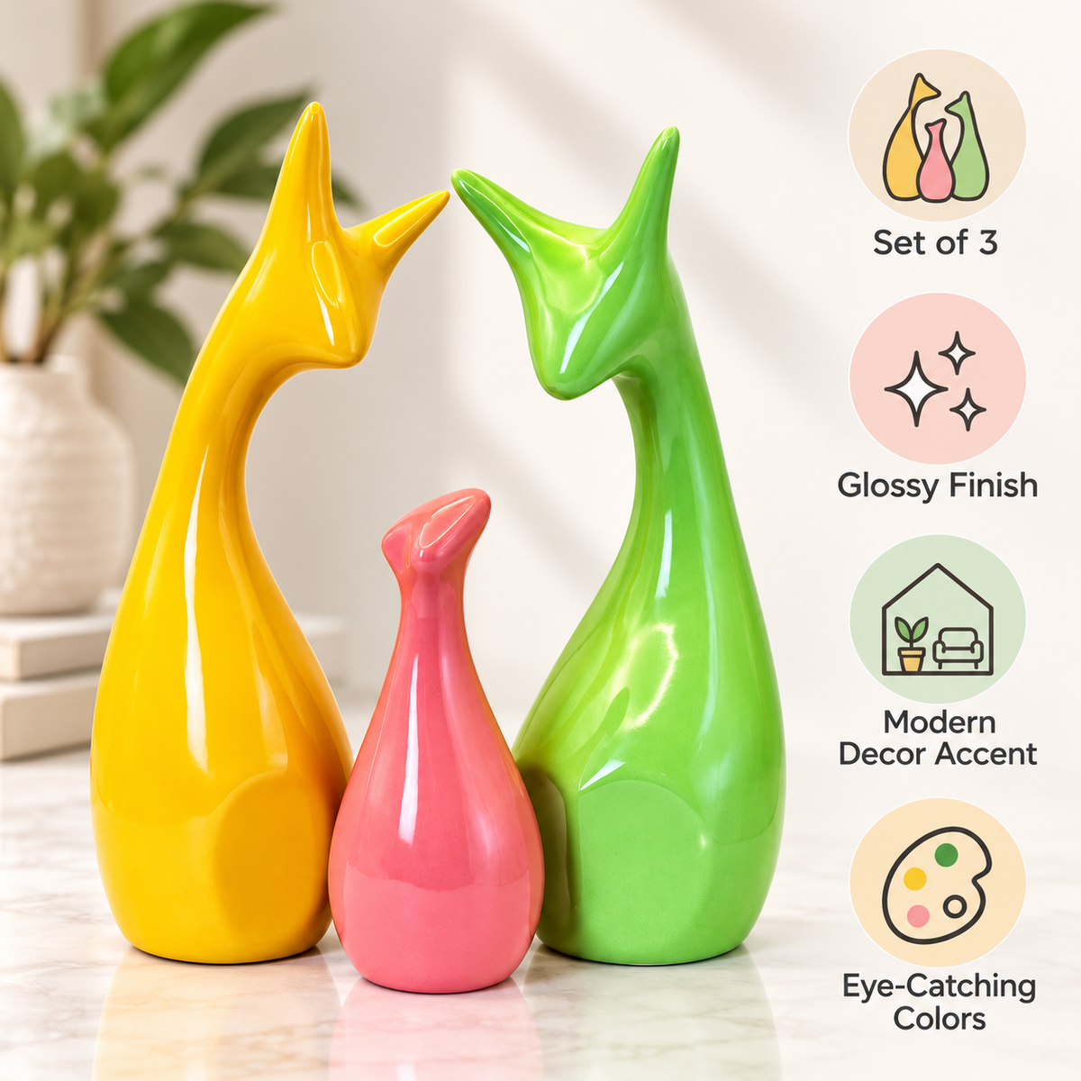 Set of three ceramic deer figures with glossy finish and vibrant colors