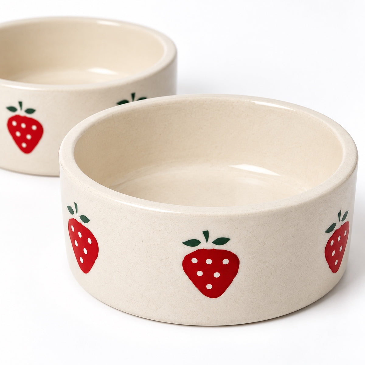 Close-up of cream ceramic bowl with strawberry design